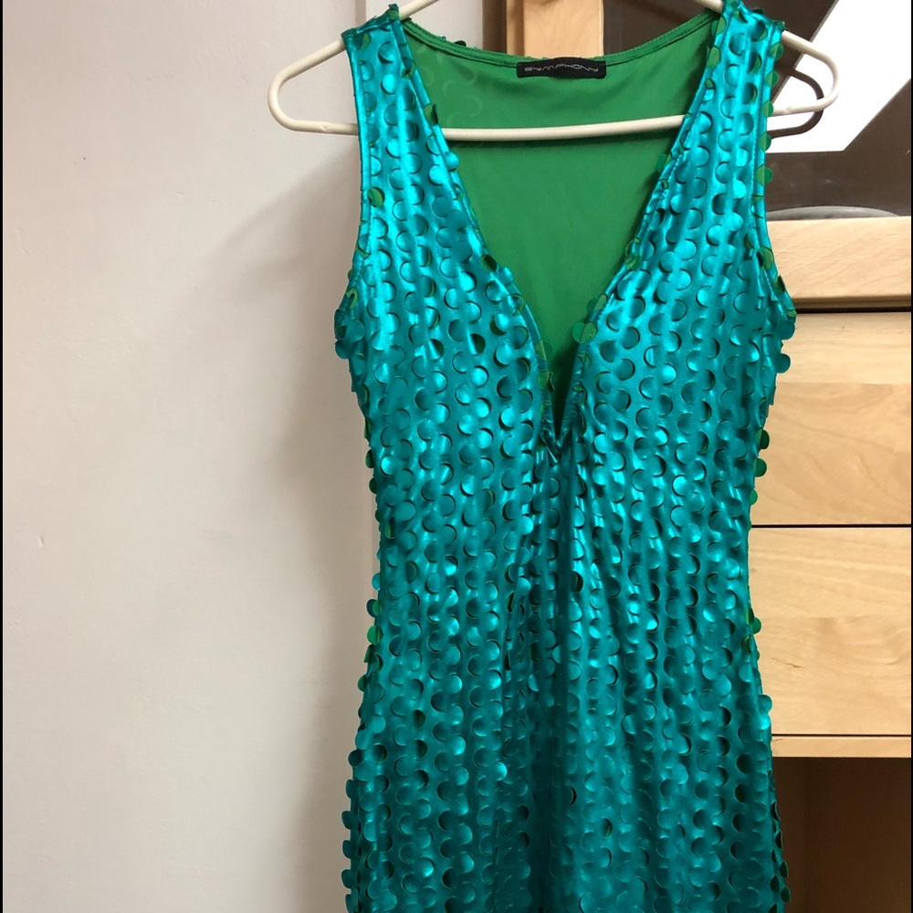 Mini dress. 100% polyester. Kinda holographic